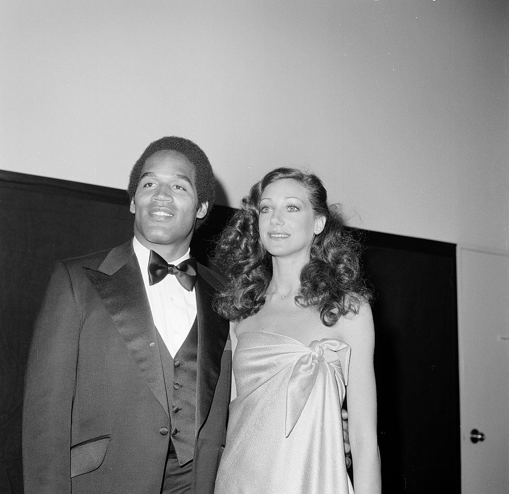 Marisa Berenson with football player O. J. Simpson, 1970.