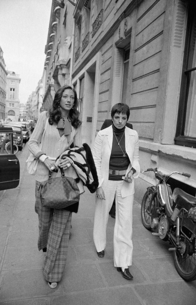 Marisa Berenson and Liza Minnelli on a street in Paris on September 13, 1972
