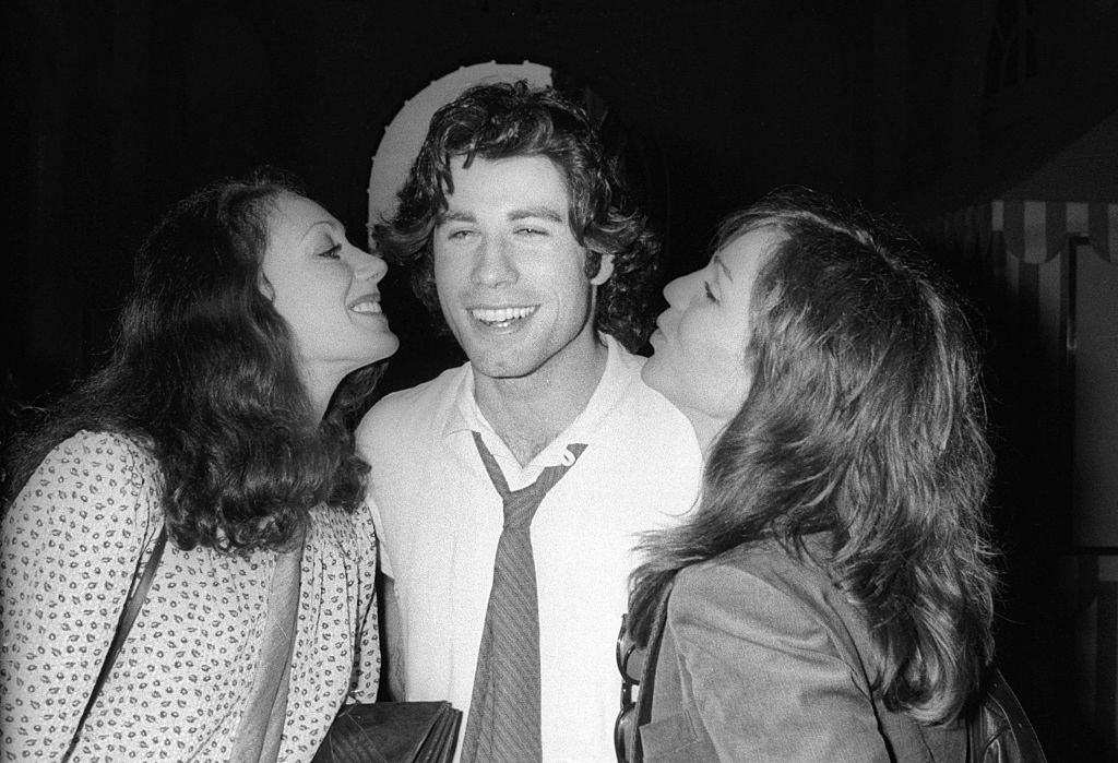 Marisa Berenson with John Travolta and Versailles, 1978.