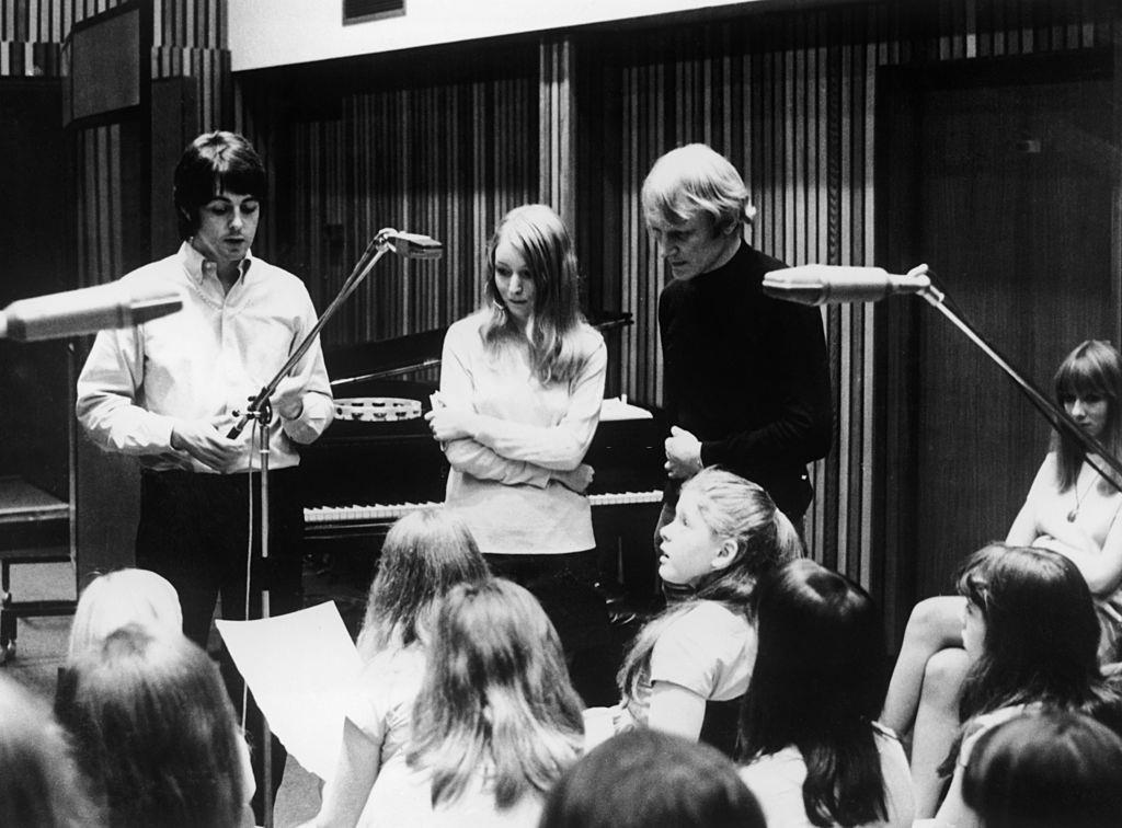 Mary Hopkin with Paul McCartney and Richard Newson enlist the aid of the Aida Foster Children's Choir to record Hopkin's song 'Those Were the Days' for the Apple label, 26th July 1968.