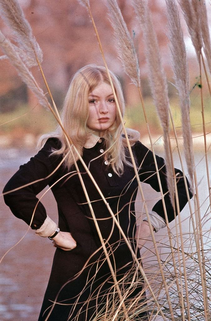 Mary Hopkin posing behind the Needle grasses, 1960s.