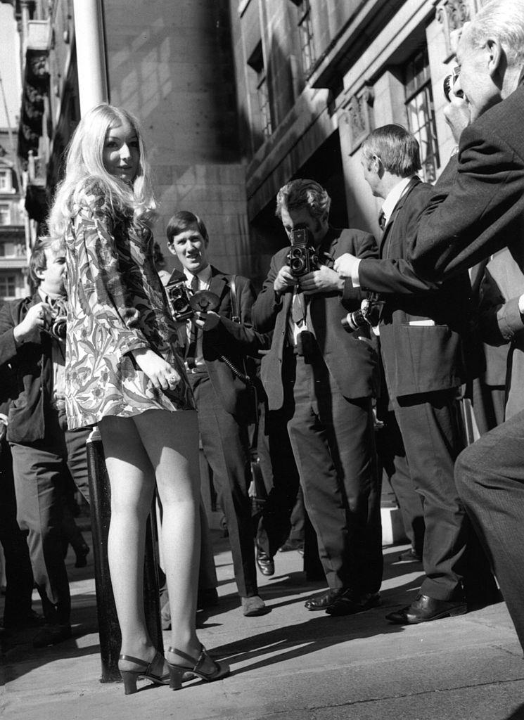 Mary Hopkin poses for press photographers outside the BBC in London, 1969.