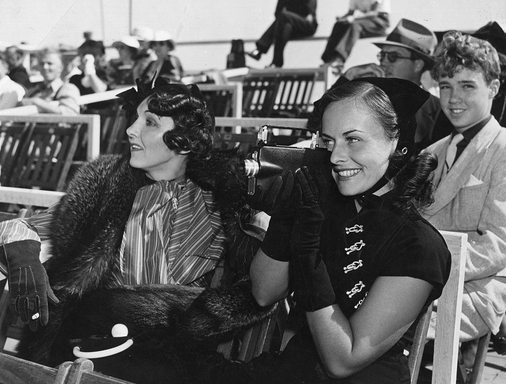 Paulette Goddard with Burgess Meredith and Erich Remarque, 1935.