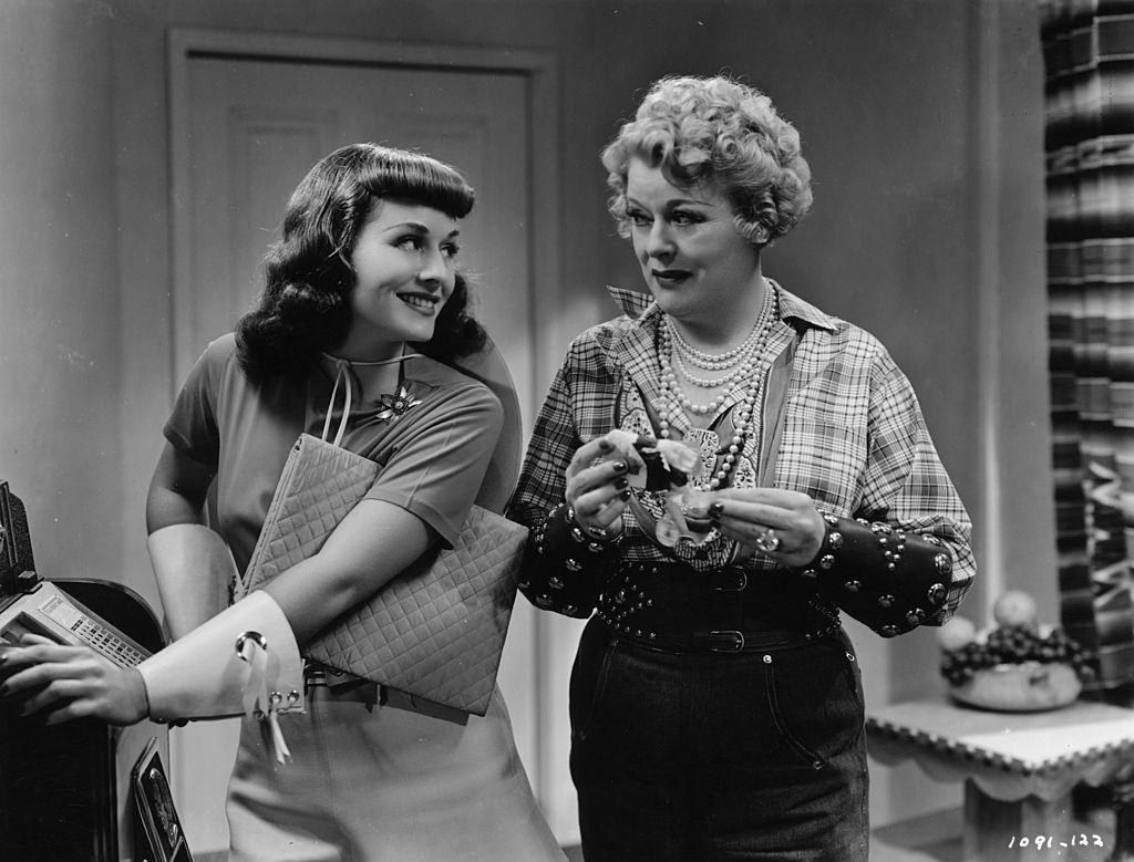 Paulette Goddard with Mary Boland in a scene from 'The Women', 1939.