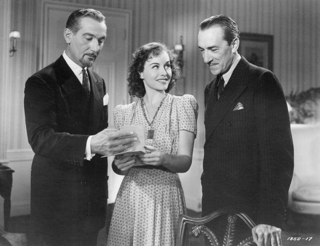 Paulette Goddard with Paul Lukas and Pedro de Cordob in the movie 'The Ghost Busters', 1940.