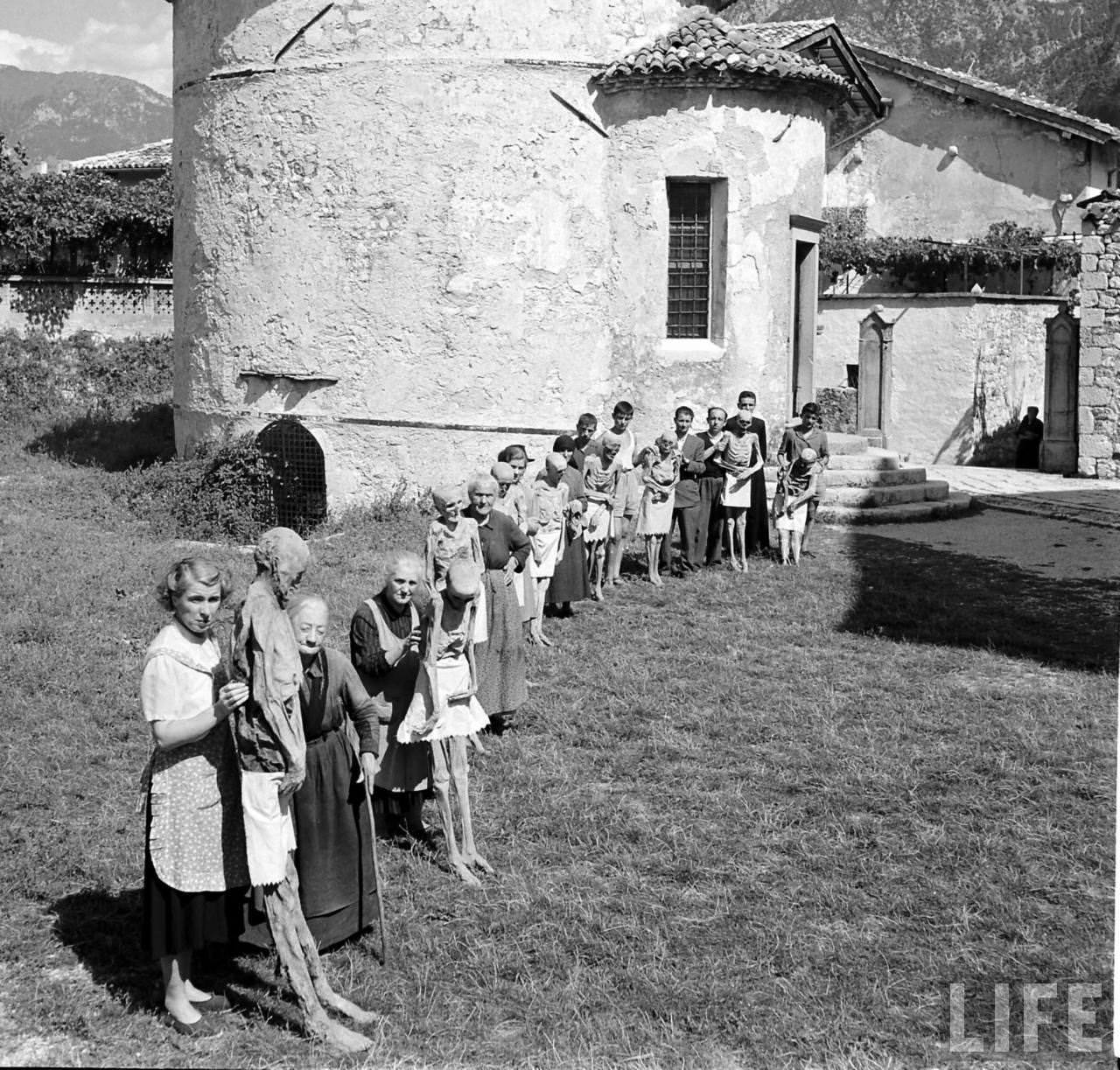 People Living with a Normal Life with Mummies in Venzone, Italy in 1950