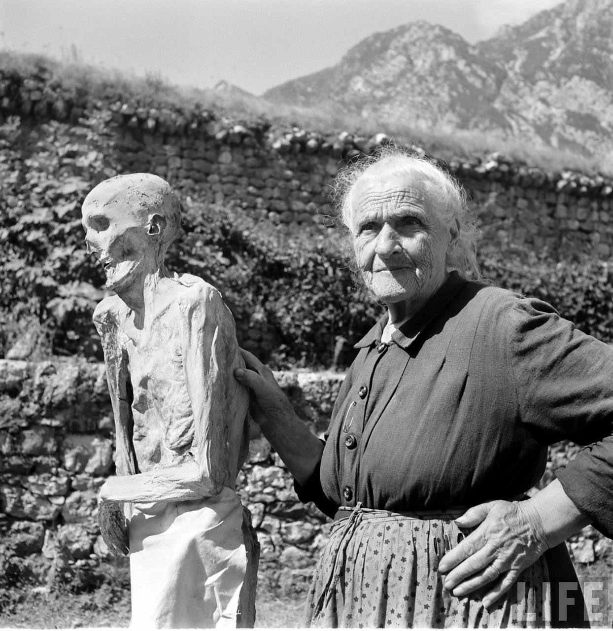 People Living with a Normal Life with Mummies in Venzone, Italy in 1950