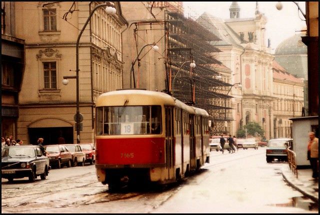 A tram trundles at a leisurely pace through the Nové Město towards the National Theatre