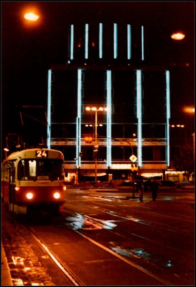 A night tram enters Václavské Námesti past the Dům Dětsky department store