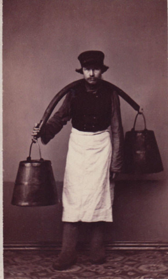 House-porter carrying water.