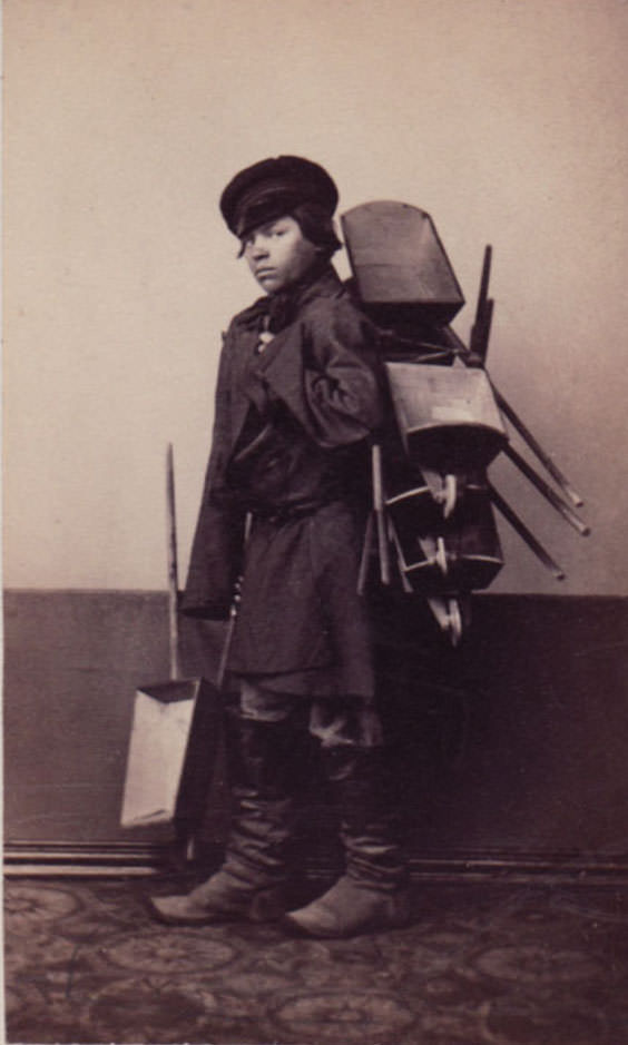 Boy selling wheelbarrows.