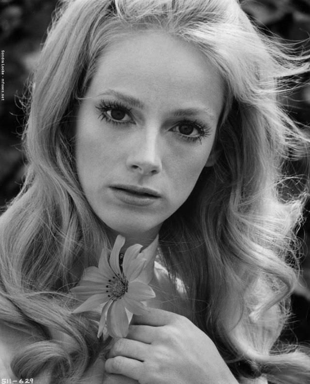 Sondra Locke Posing with a flower, 1970.