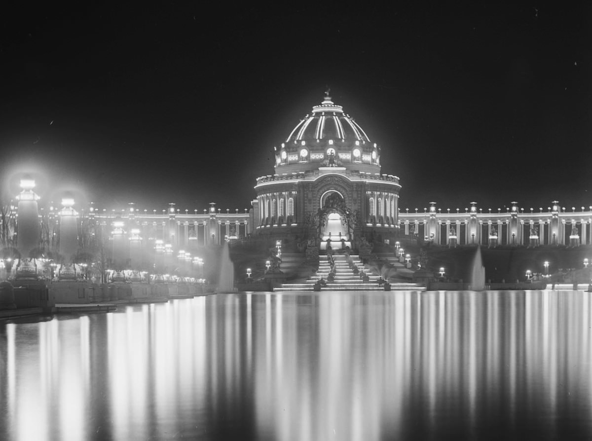 A night view of the illuminated Festival Hall and Cascades from the Plaza of St.