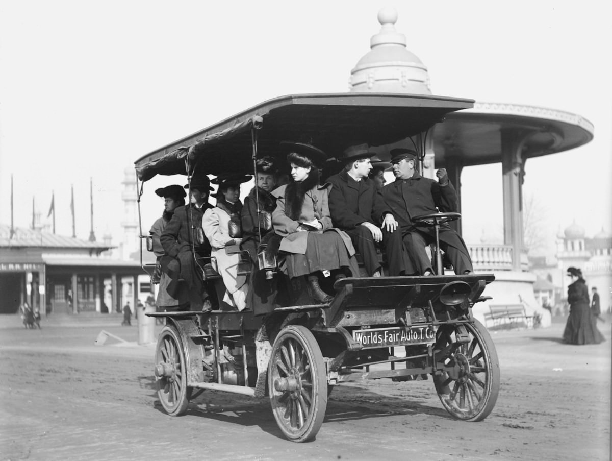 Fairgoers travel in a World's Fair autobus.