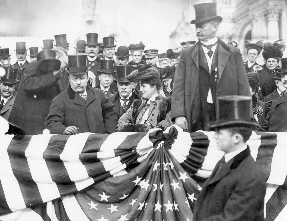 President and Mrs. Roosevelt, and David R. Francis, photographed in the reviewing stand on Roosevelt Day, November 26, 1904