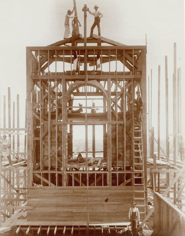 Carpenters at work on the Palace of Varied Industries during construction for the 1904 World's Fair, 1902