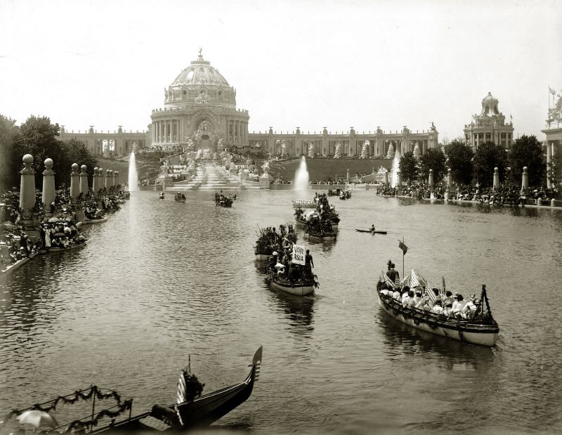 Floral Parade of All Nations procession on the Grand Lagoon in front of Festival Hall during the 1904 World's Fair. (Gondola with sign "Visit Asia"), 1904