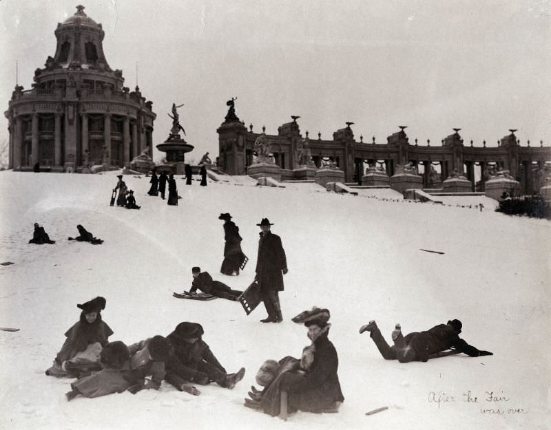 St. Louisans sledding down Art Hill after the 1904 World's Fair was over. The East Restaurant Pavilion and Colonnade of States are still visible in the background, 1904-05