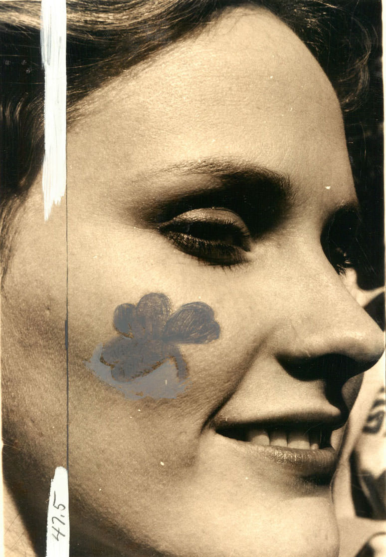 Debbie Cook with a shamrock on her cheek at Hopkins Plaza. 1979.