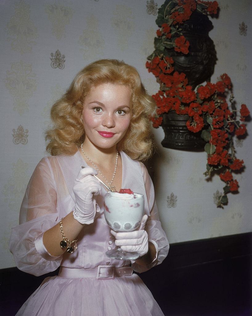 Tuesday Weld enjoys an ice cream sundae, 1965.