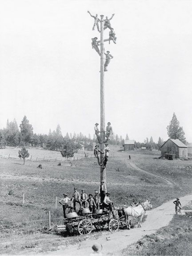 Stunning Photos of Linemen Working on Wooden Utility Poles from the Early 1900s
