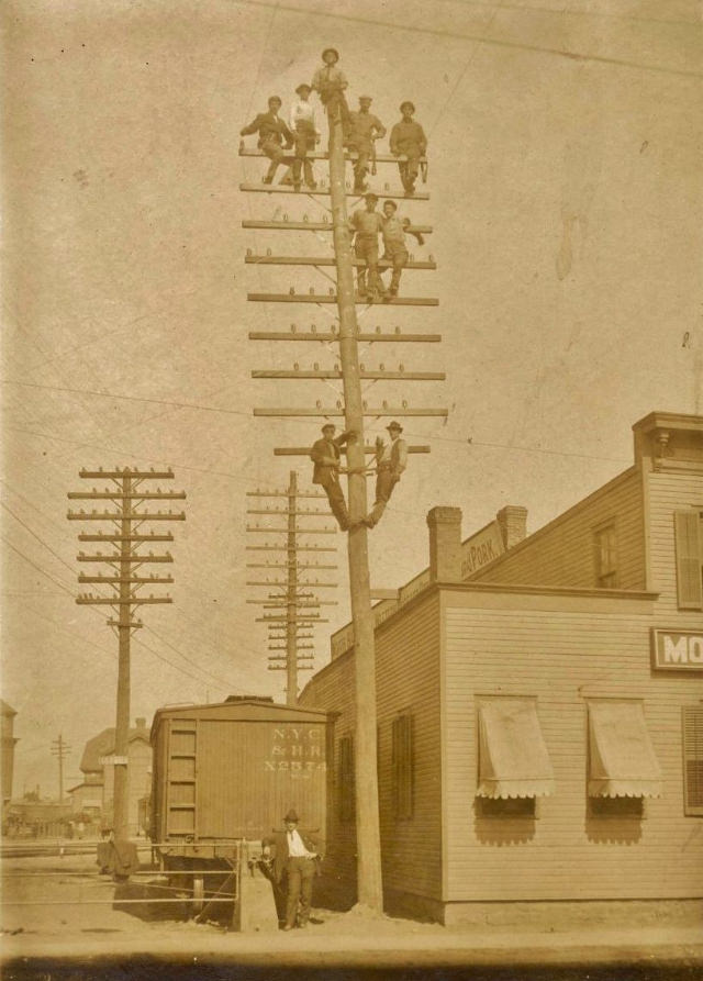 Stunning Photos of Linemen Working on Wooden Utility Poles from the Early 1900s