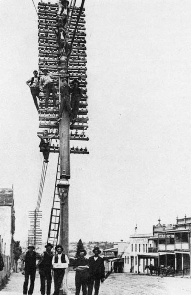 Stunning Photos of Linemen Working on Wooden Utility Poles from the Early 1900s