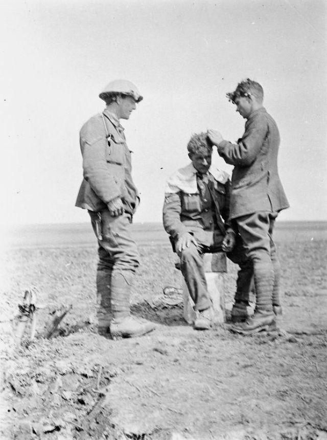 Historical Photos show Soldiers getting Haircuts during World War I