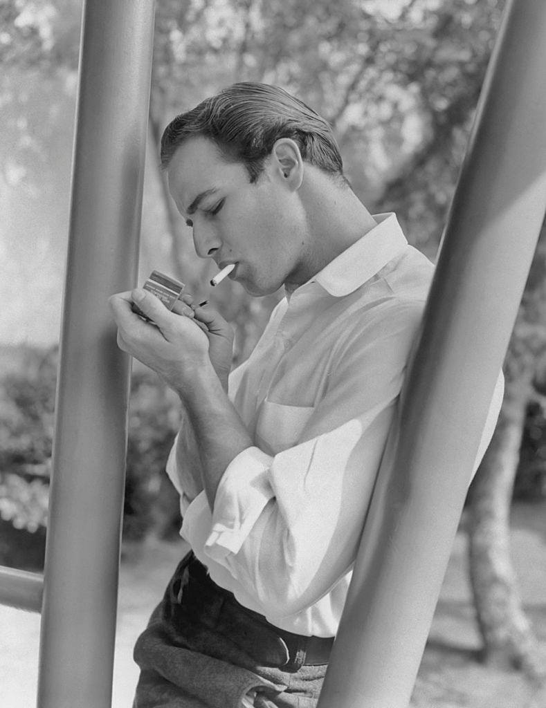 Marlon Brando lighting up a cigarette, 1952.