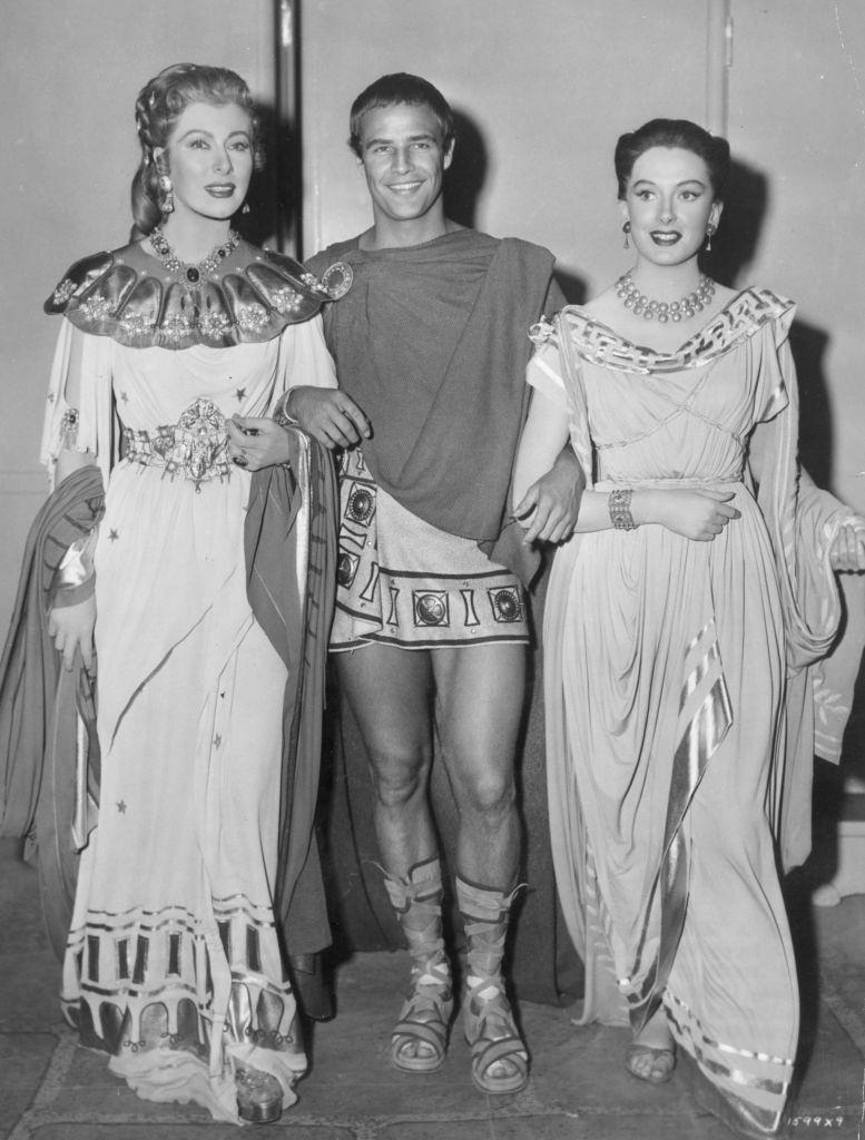Marlon Brando with Greer Carson and Deborah Kerr in costume on the set of the film 'Julius Caesar', 1953.