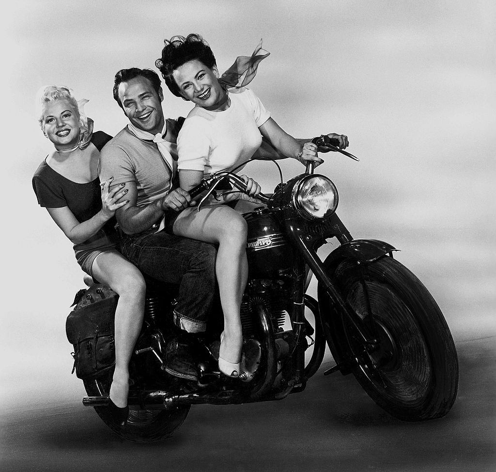 Marlon Brando with Peggy Maley and Yvonne Doughty, 1953.