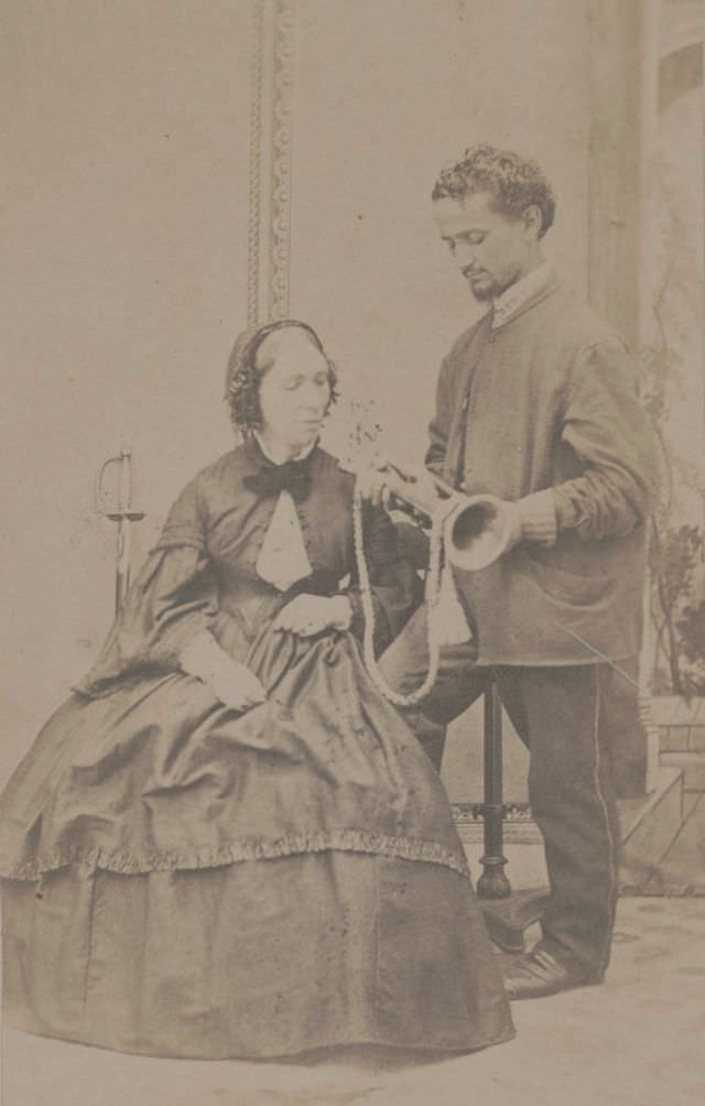 Eleanor C. Ransom, also known as "Mother," Civil War nurse, who worked in a Union hospital in Tennessee and aboard the transport ship "North America", with Union soldier who is showing her a bugle