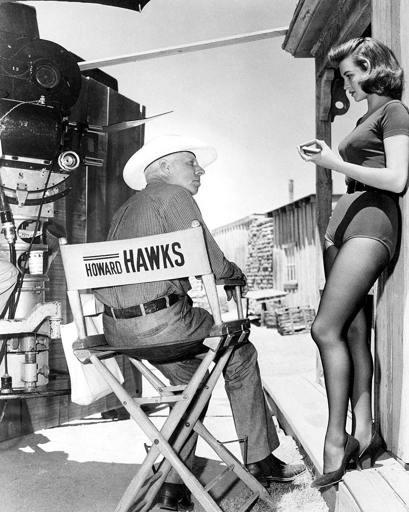 Angie Dickinson with director Howard Hawks on the set of 'Rio Bravo', 1959.