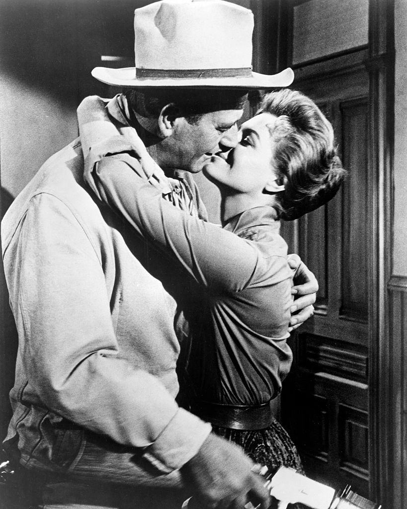 Angie Dickinson with John Wayne, 1959.