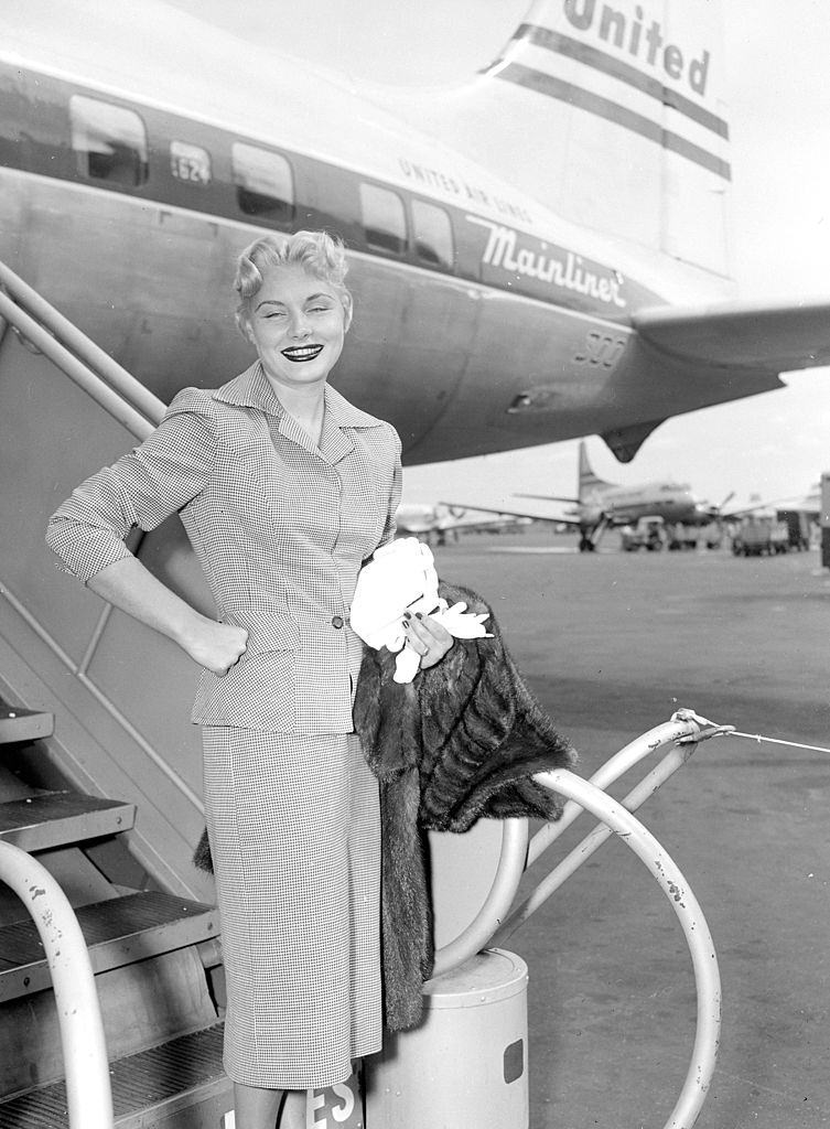 Barbara Payton arrives at LaGuardia Airport, 1951.