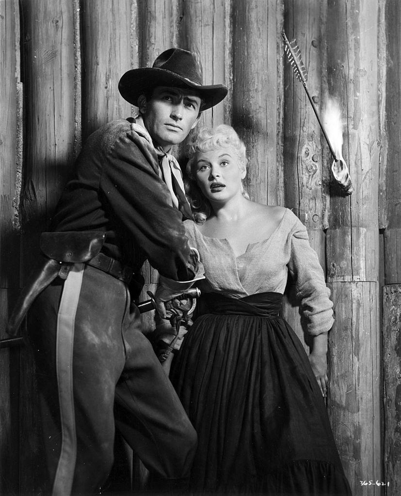 Barbara Payton with actor Gregory Peck in the movie 'Only the Valiant', 1950.