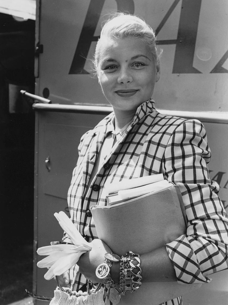 Barbara Payton in the Britain to film 'The Four Sided Triangle', at London Airport, July 24th 1952.