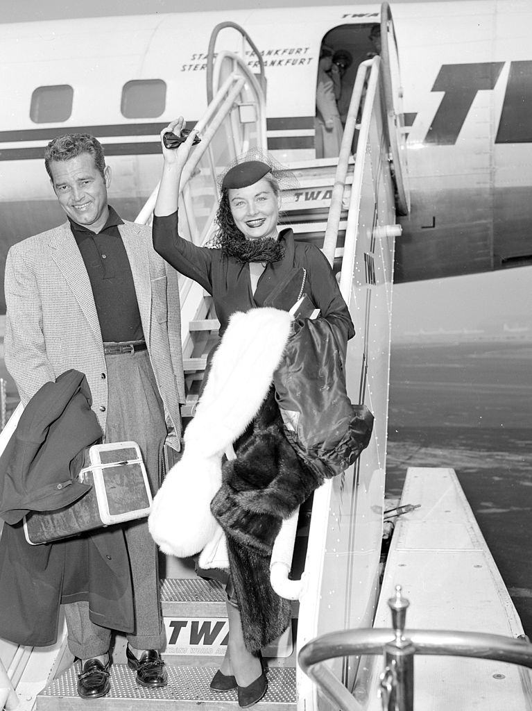 Barbara Payton and Tom Neal arrives at Idlewild Airport, 1953.