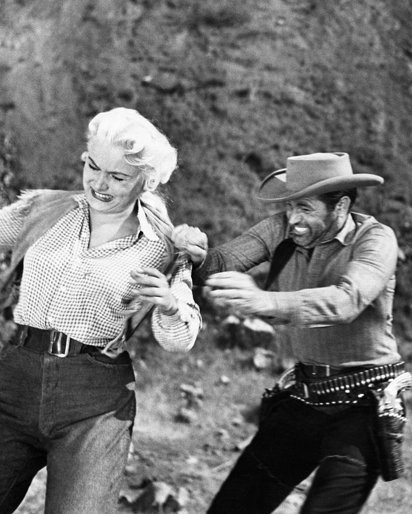 Barbara Payton and Tom Neal in Scenes from 'The Great Jesse James Raid', 1953.