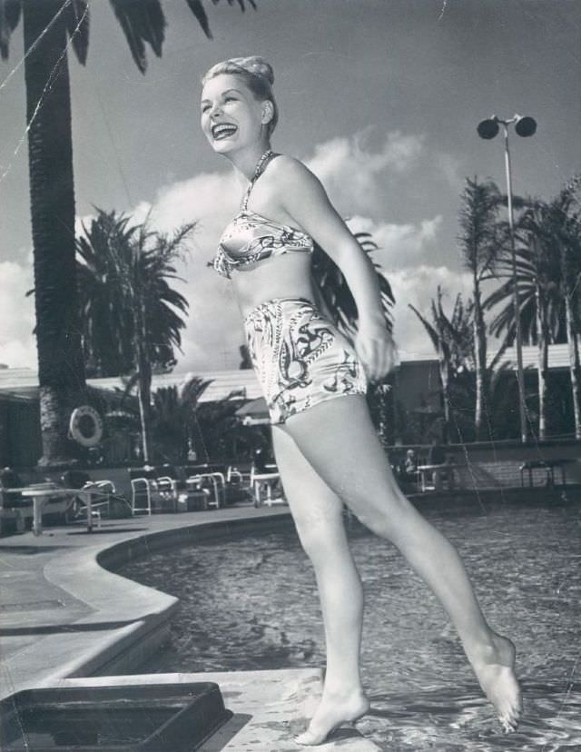 Barbara Payton by the poolside, 1950.