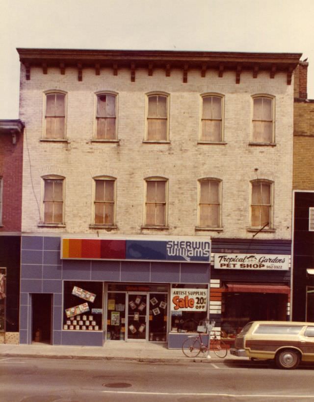 Sherwin Williams store at 303 and Tropical Gardens Pet Shop at 301½ Front Street, Belleville