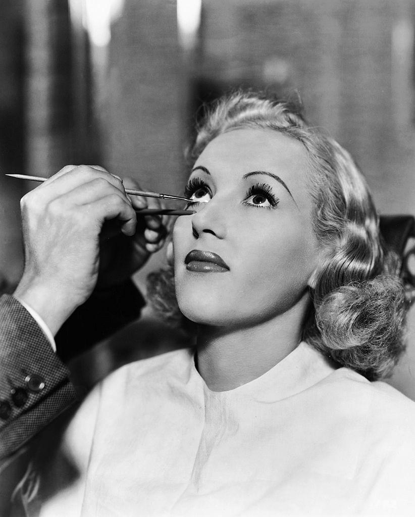 Beautician applying Makeup on Betty Grable, 1937.