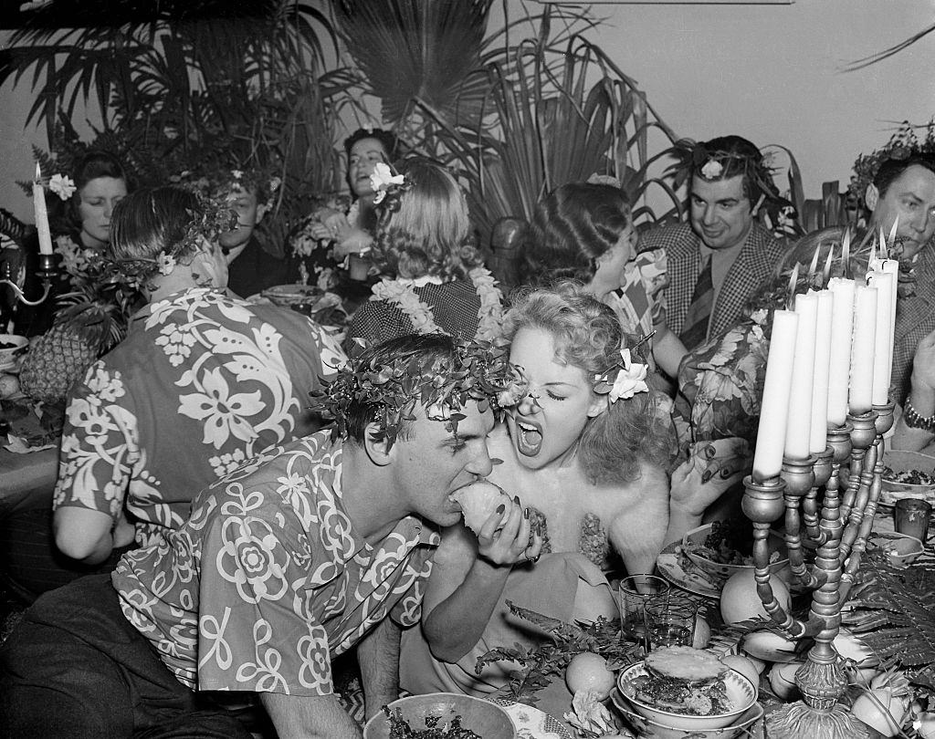 Betty Grable feeding her husband in a show, 1938.