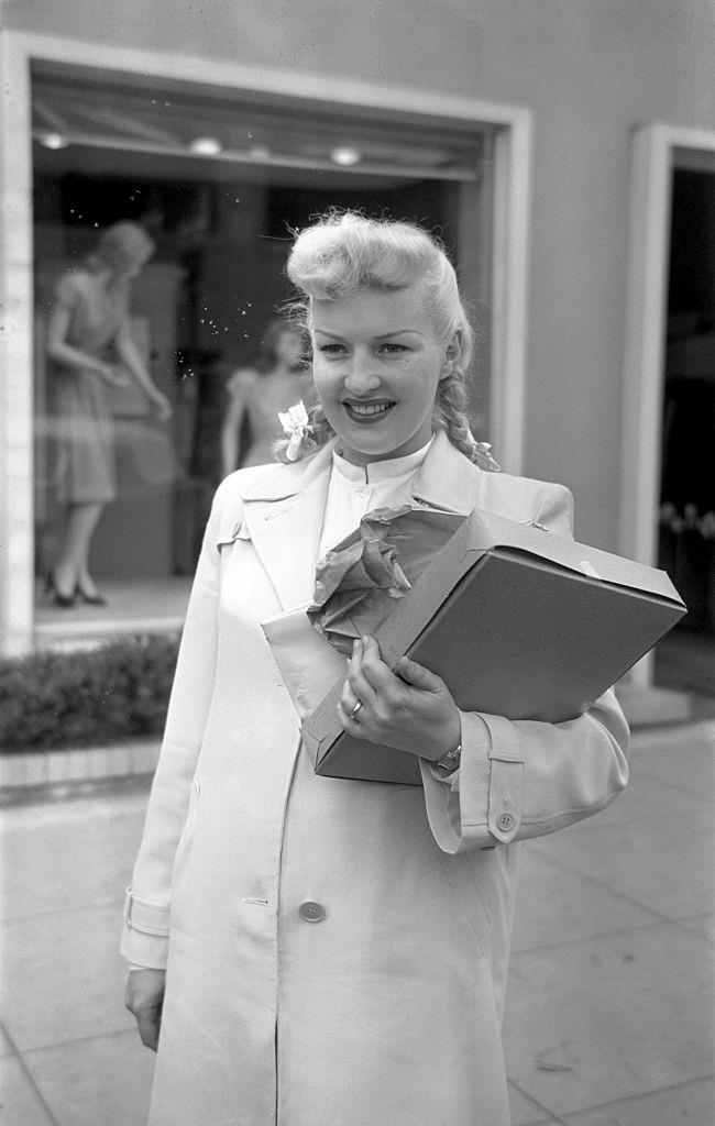 Betty Grable poses on a street in Los Angeles, 1940.