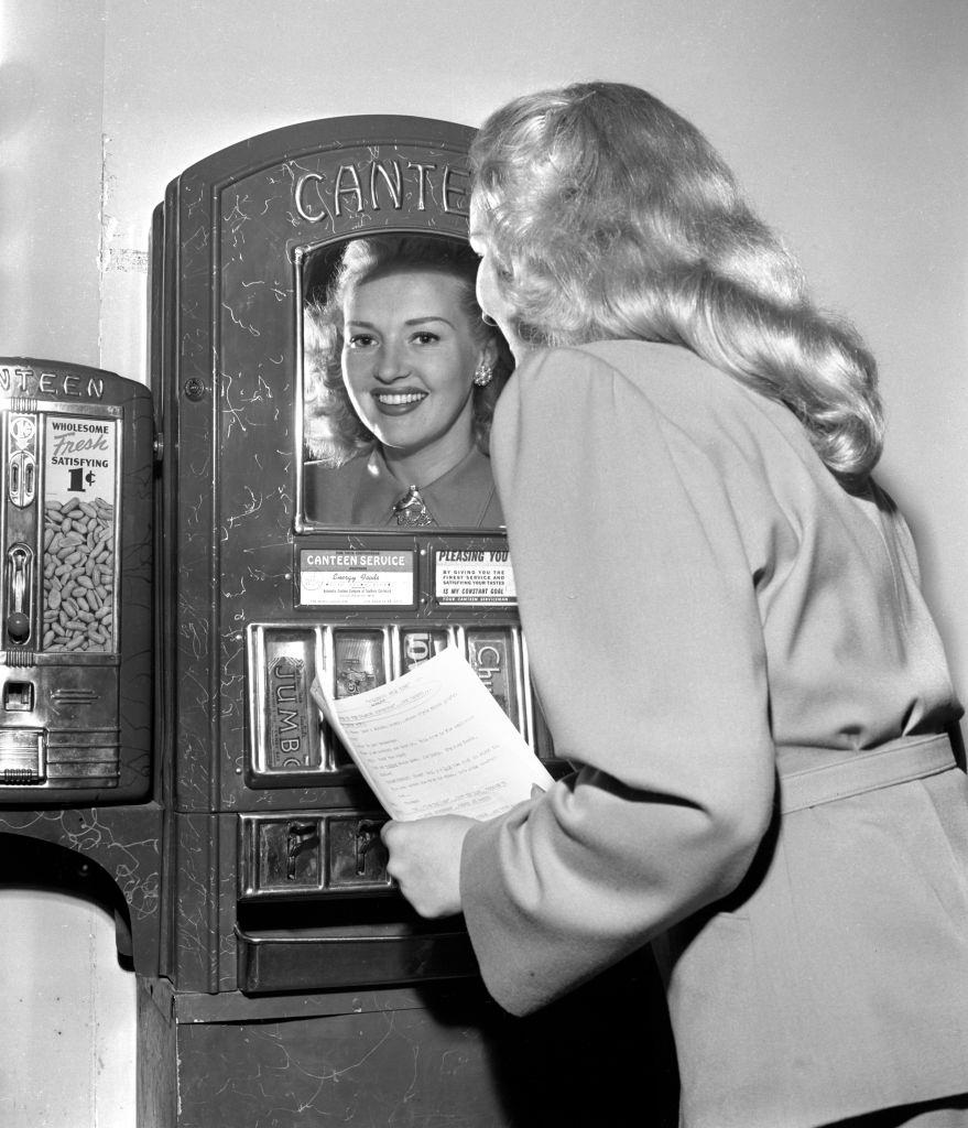 Betty Grable with a script for Diamond Horseshoe on the CBS Radio program Hollywood Star Time, Sunday, April 14, 1946.