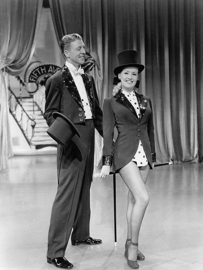 Betty Grable with Dan Dailey in a scene from the film 'Mother Wore Tights', 1947.