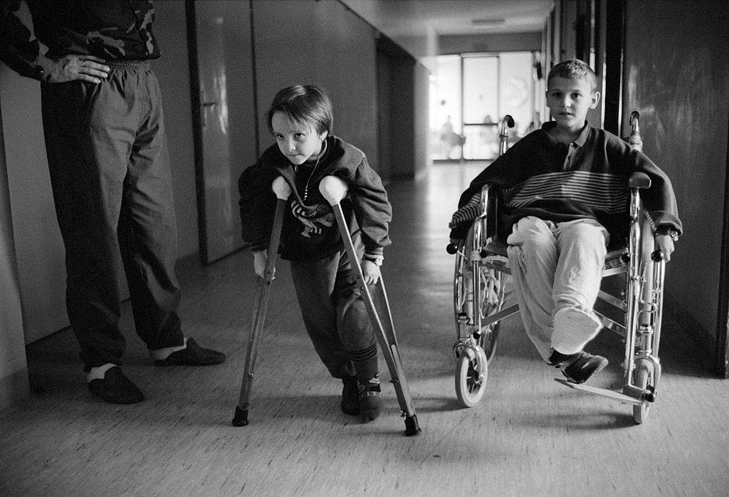 Children injured in the Yugoslav war moving along the corridors of Kosevo Hospital in Sarajevo.