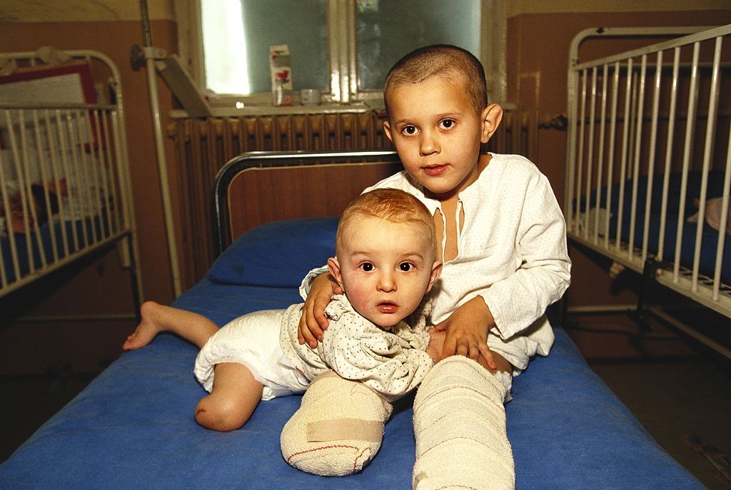 Amputee children, wounded during the siege of Sarajevo, photographed in a Sarajevo hospital while they wait to be evacuated to a sympathetic European country.