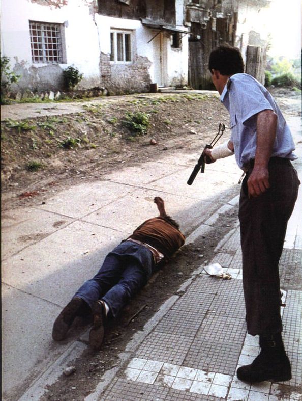 Serb police officer Goran Jelisic, shooting a victim in Brcko, Bosnia and Herzegovina.