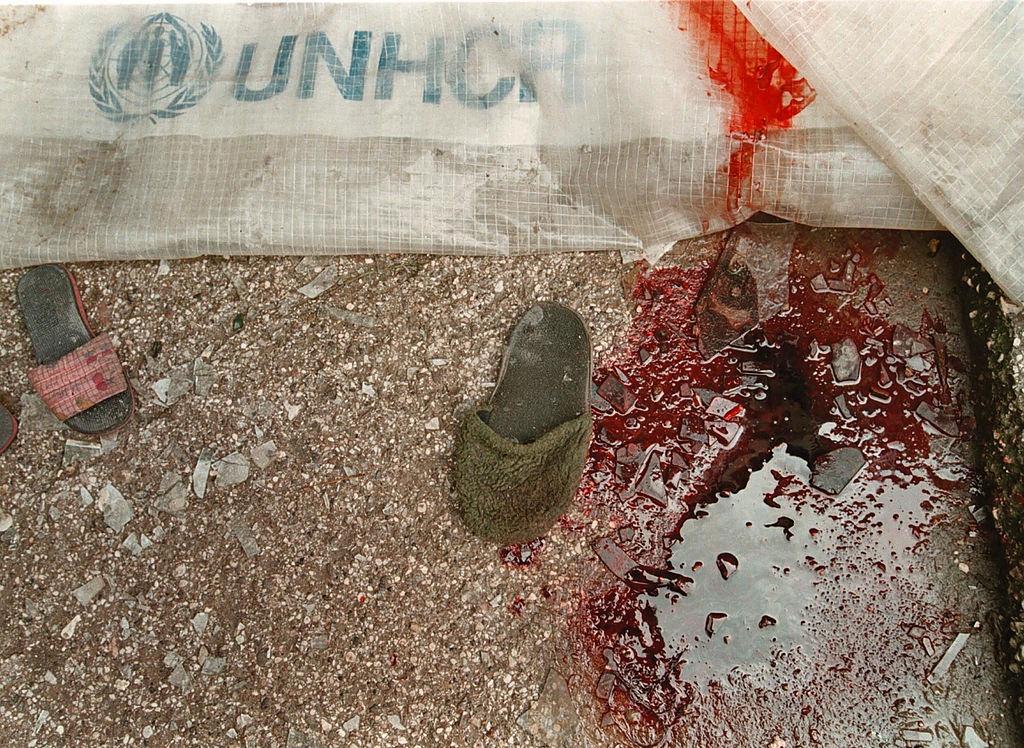 A plastic sheet supplied by the United Nations High Commissioner for Refugees (UNHCR) is covered with blood Monday June 26, 1995